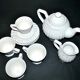 Coffee set vintage tea in molded openwork earthenware signed Jline