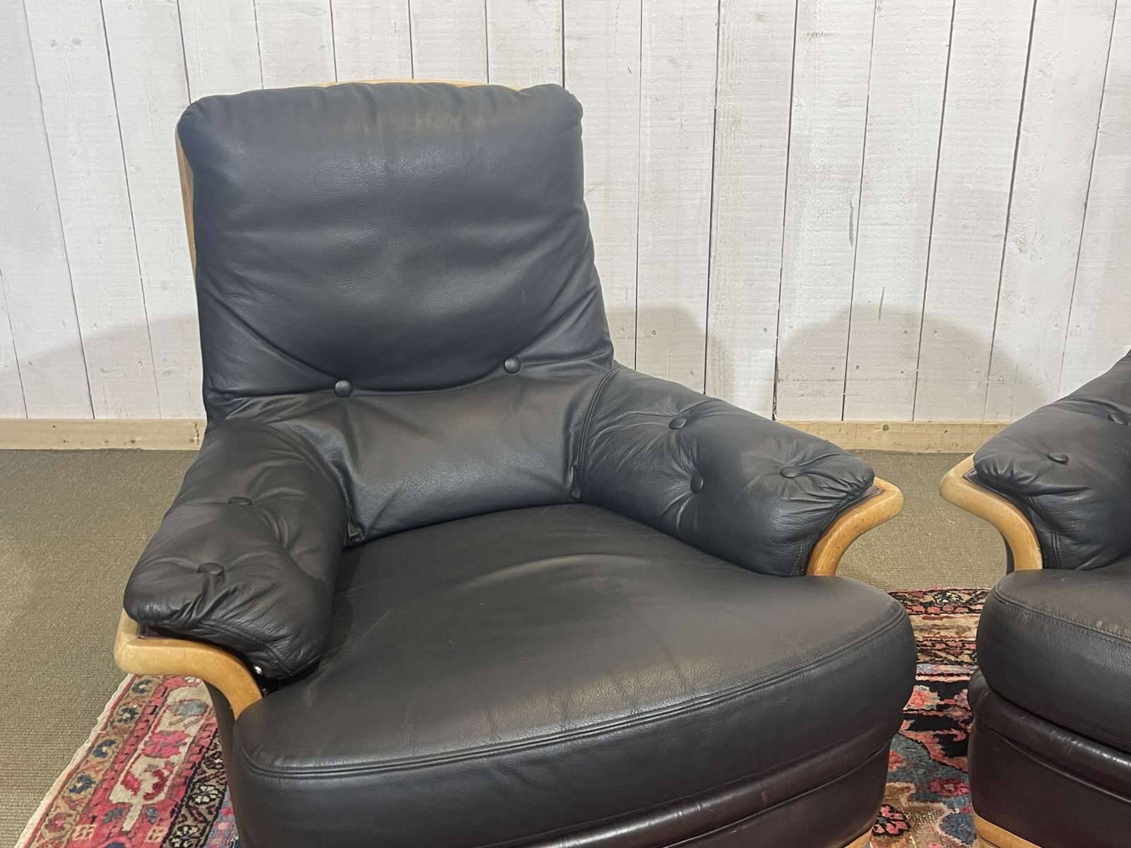 Pair of leather and beech armchairs from the 1970s.