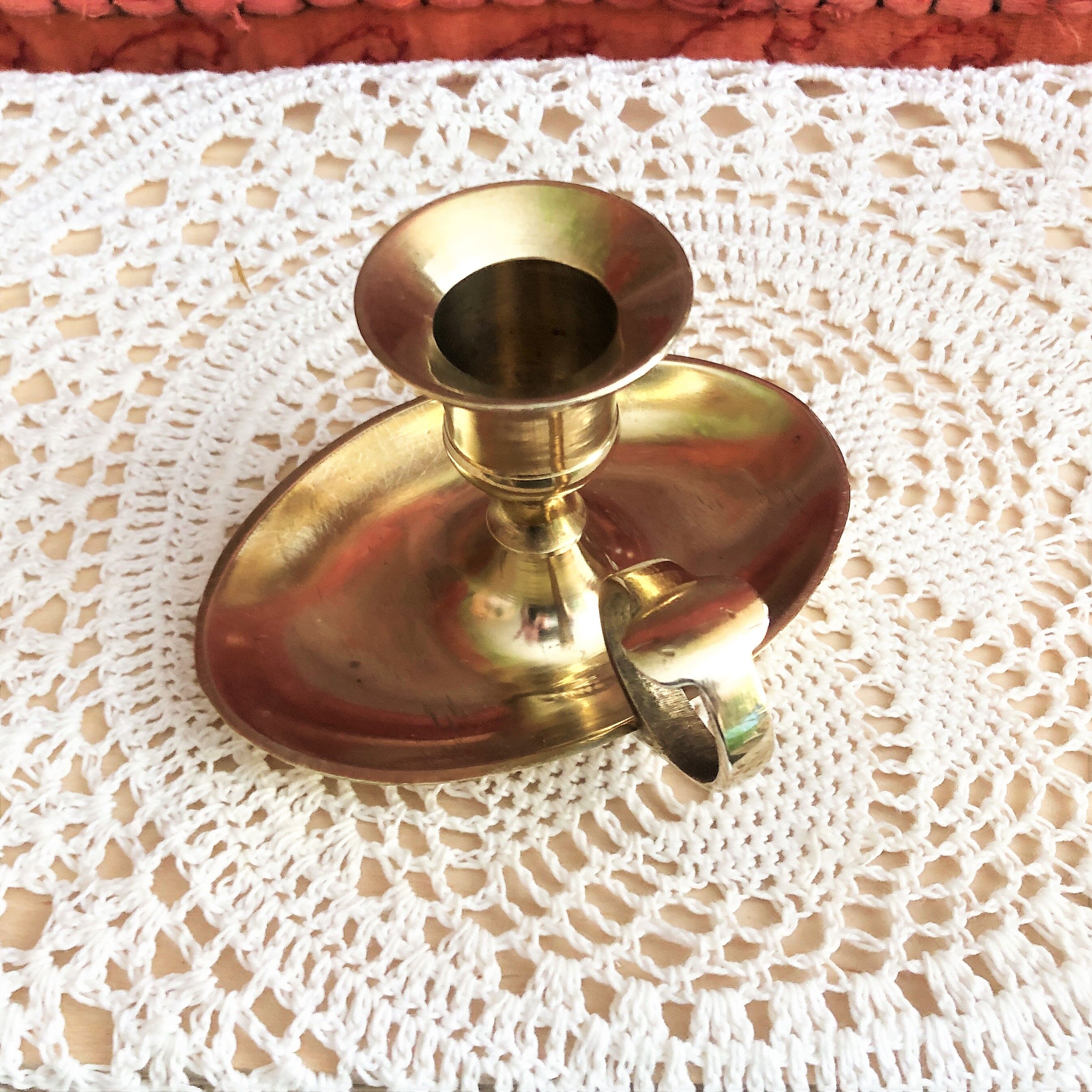 Brass oval hand candle holder