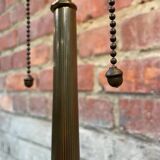 Old brass table lamp with claw feet