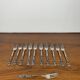 Set of 10+1 Japanese stainless steel dessert forks, rose pattern, 1970