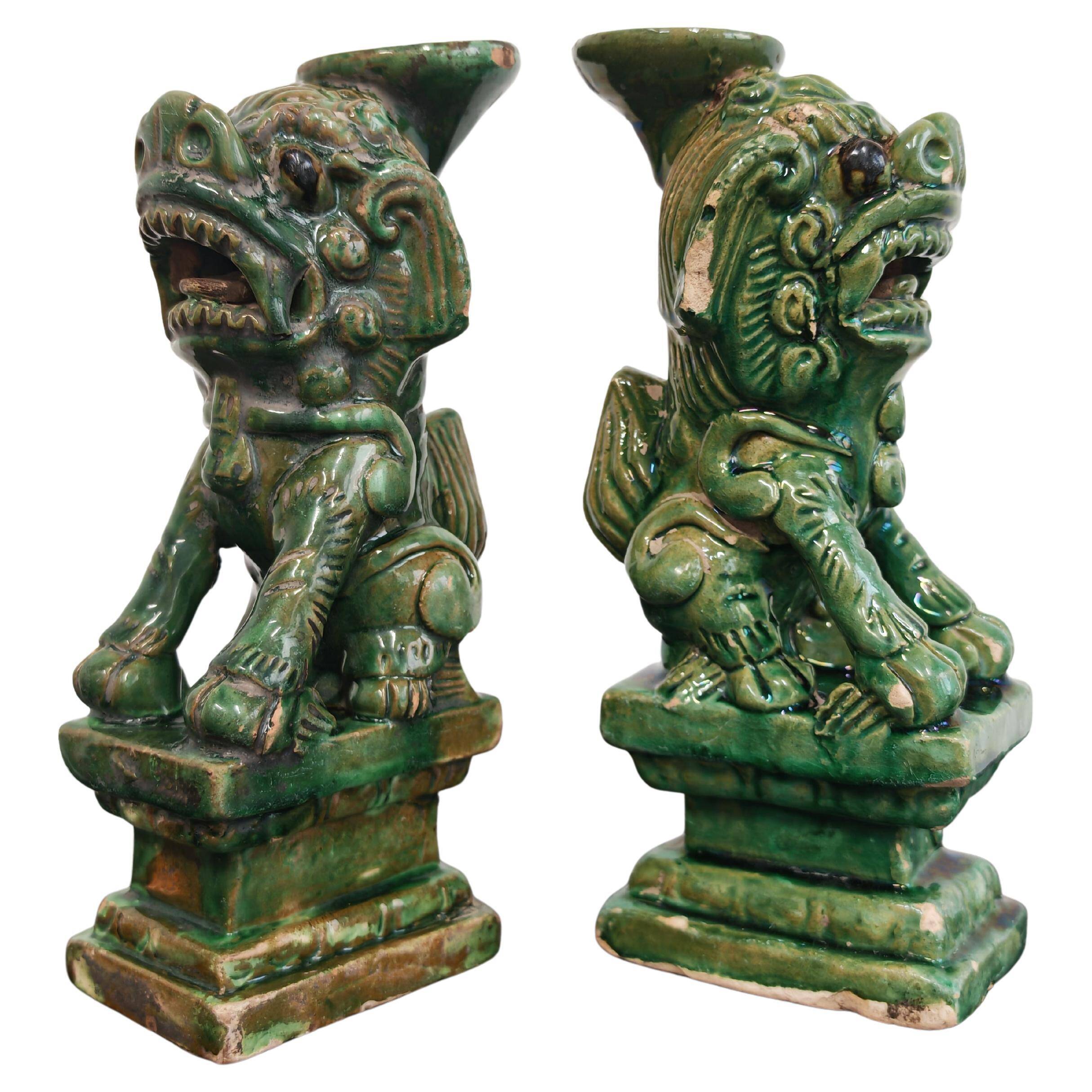 Pair of Foo Dog candle holders in ceramic, China 19th century