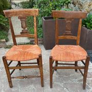 Pair of straw seated chairs