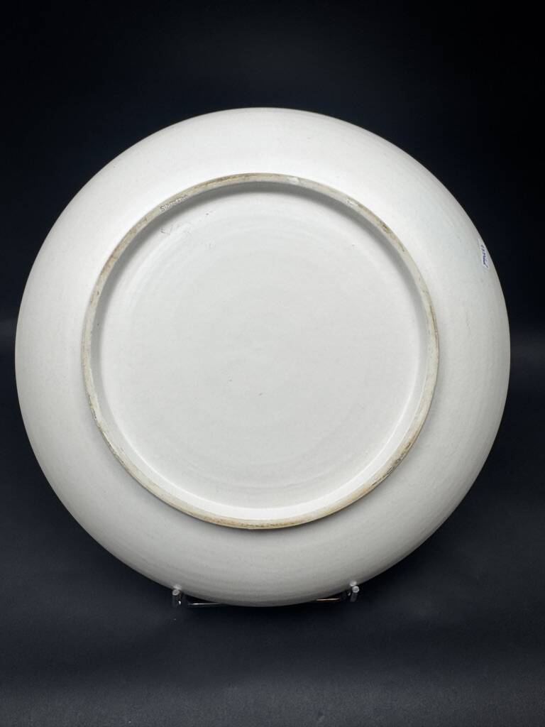 Large decorative dish signed André Baud, diameter 37 cm, enamelled decoration on a deep blue background