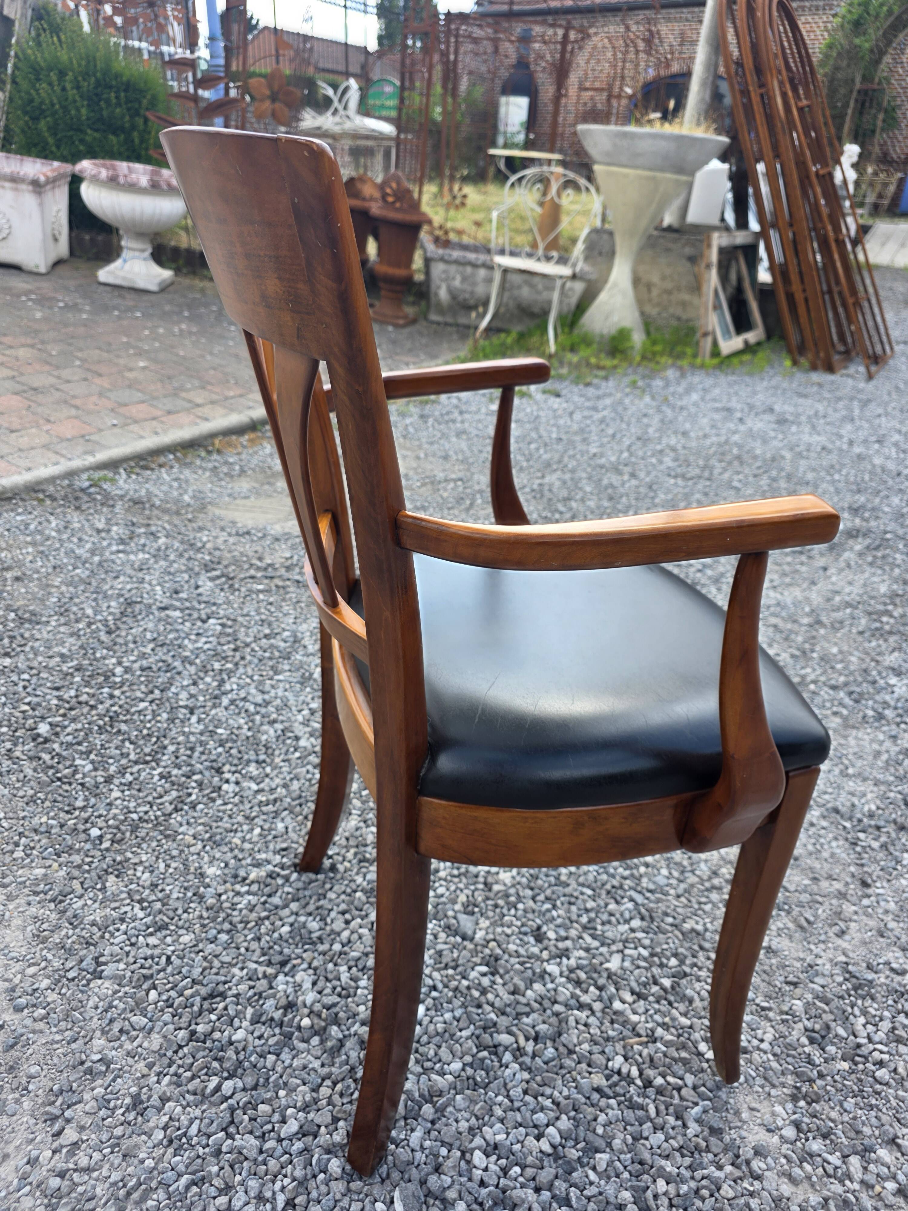 Mid-20th century solid cherry wood office chair.