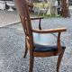 Mid-20th century solid cherry wood office chair.