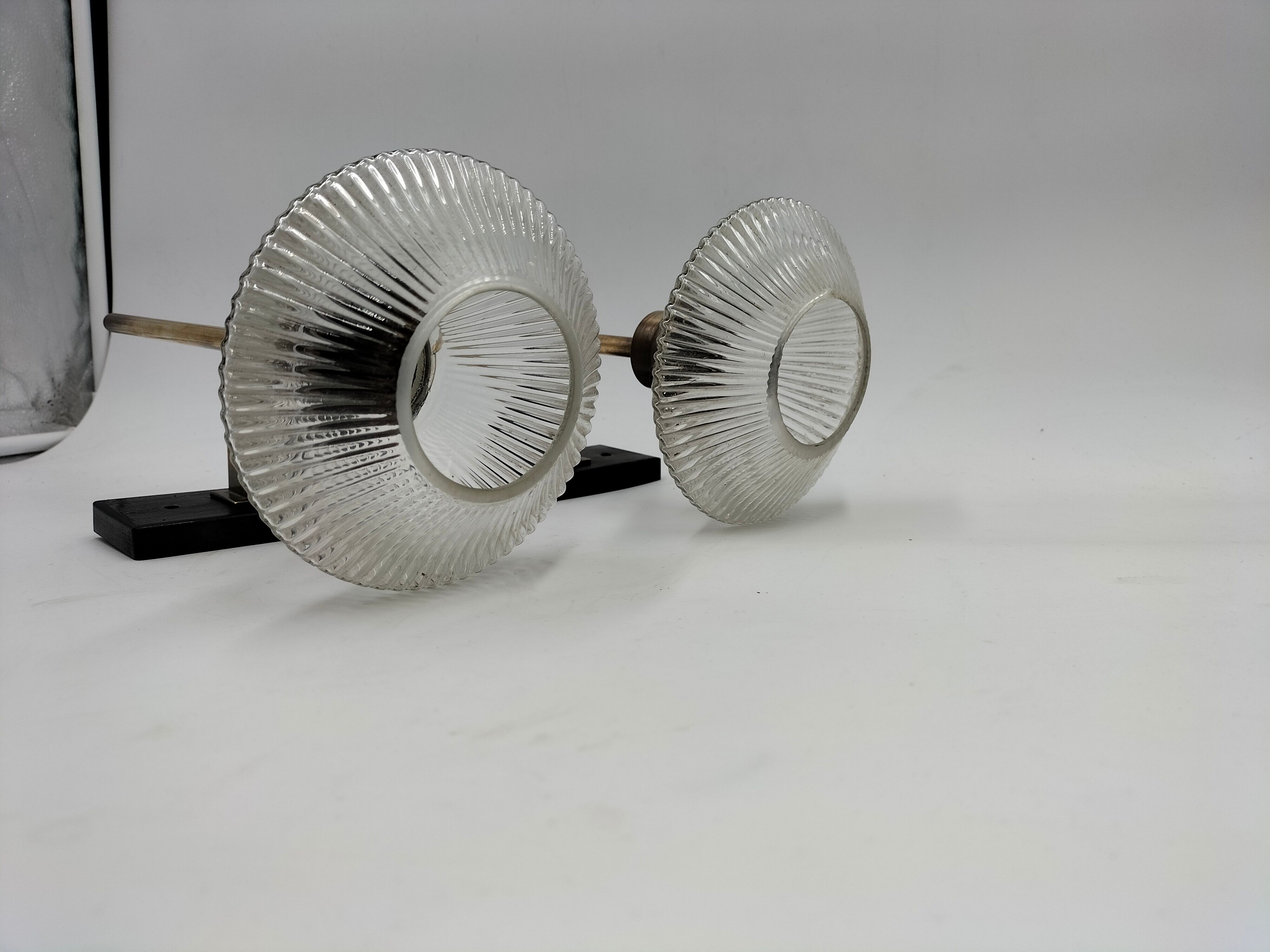Pair of brass and glass wall lamps