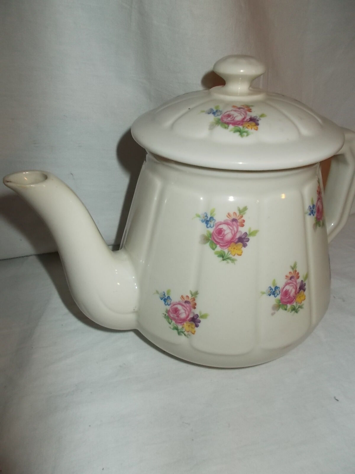 Vintage cream teapot maker