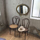 Napoleon oval mirror with 19th century cane