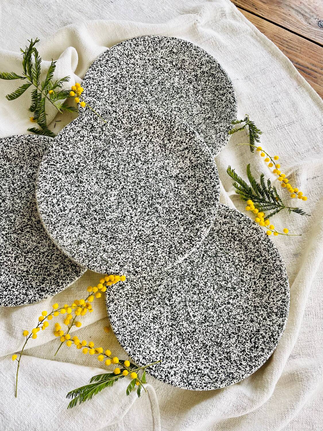 Set of 4 speckled black and white ceramic plates made in Italy