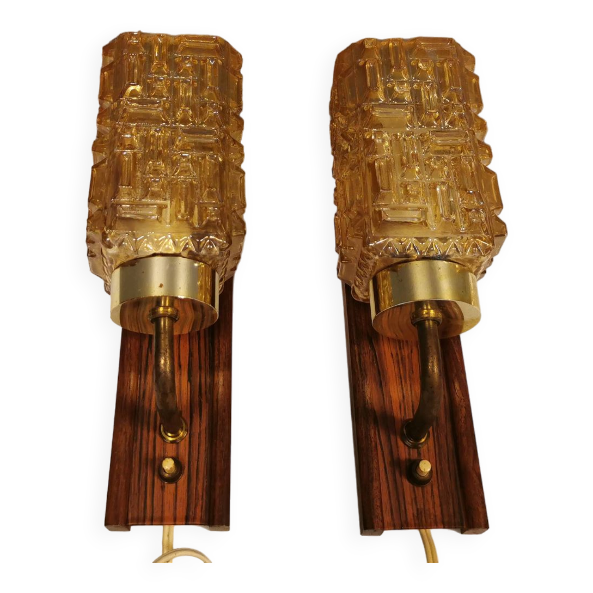 wall lights in rosewood look, with amber coloured glass and brass details.