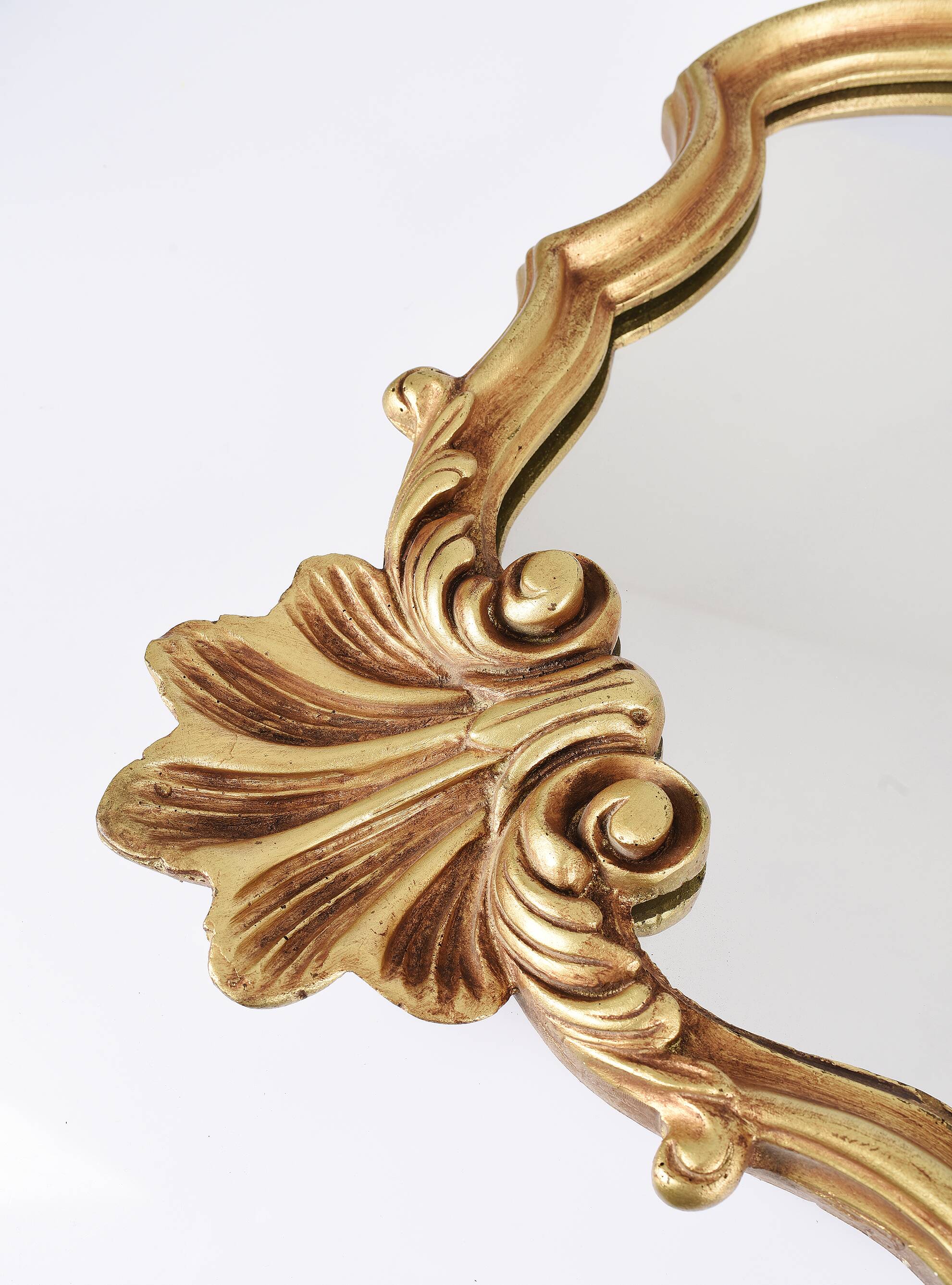 Large old mirror, golden shell, height 70 cm