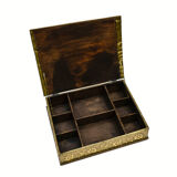 Old wooden box decorated with carved gold metal repelled vintage butterfly