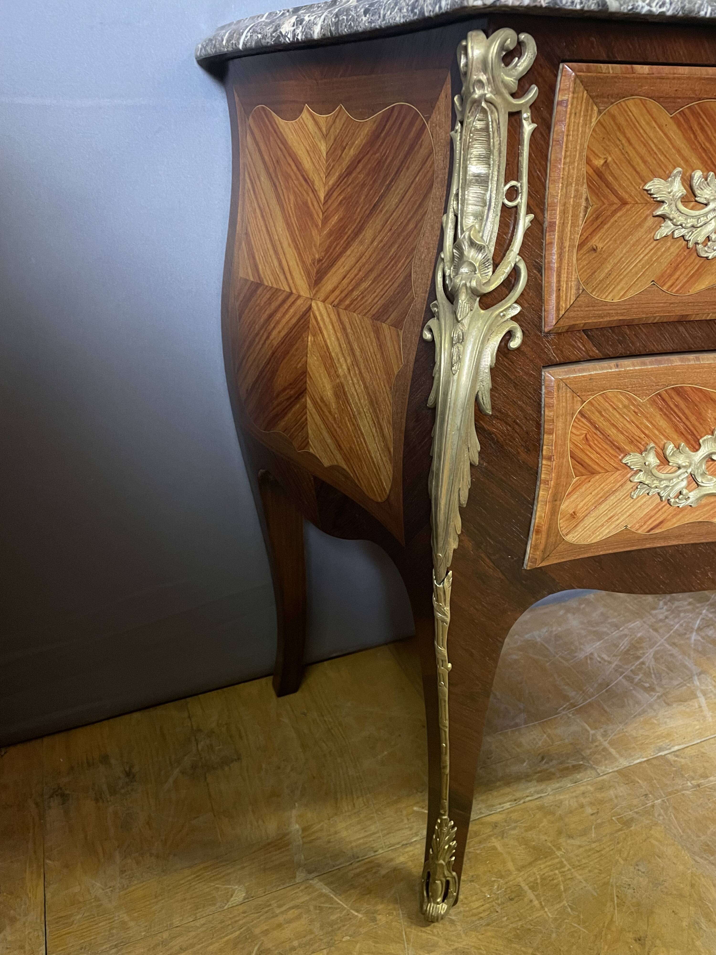 Louis XV style commode in marquetry from around 1920.