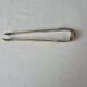 Antique brass sugar tongs