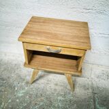 Vintage bedside table with compass legs
