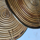 Rattan trivets attributed to Gabriella Crespi.