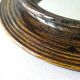 Sandstone mroir signed Robert Heraud, years 70, 27 cm