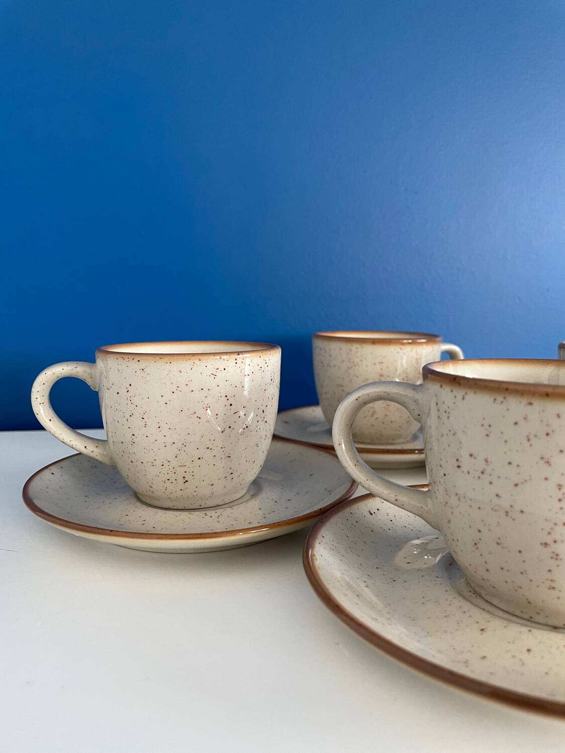 Speckled beige cup and saucer coffee set