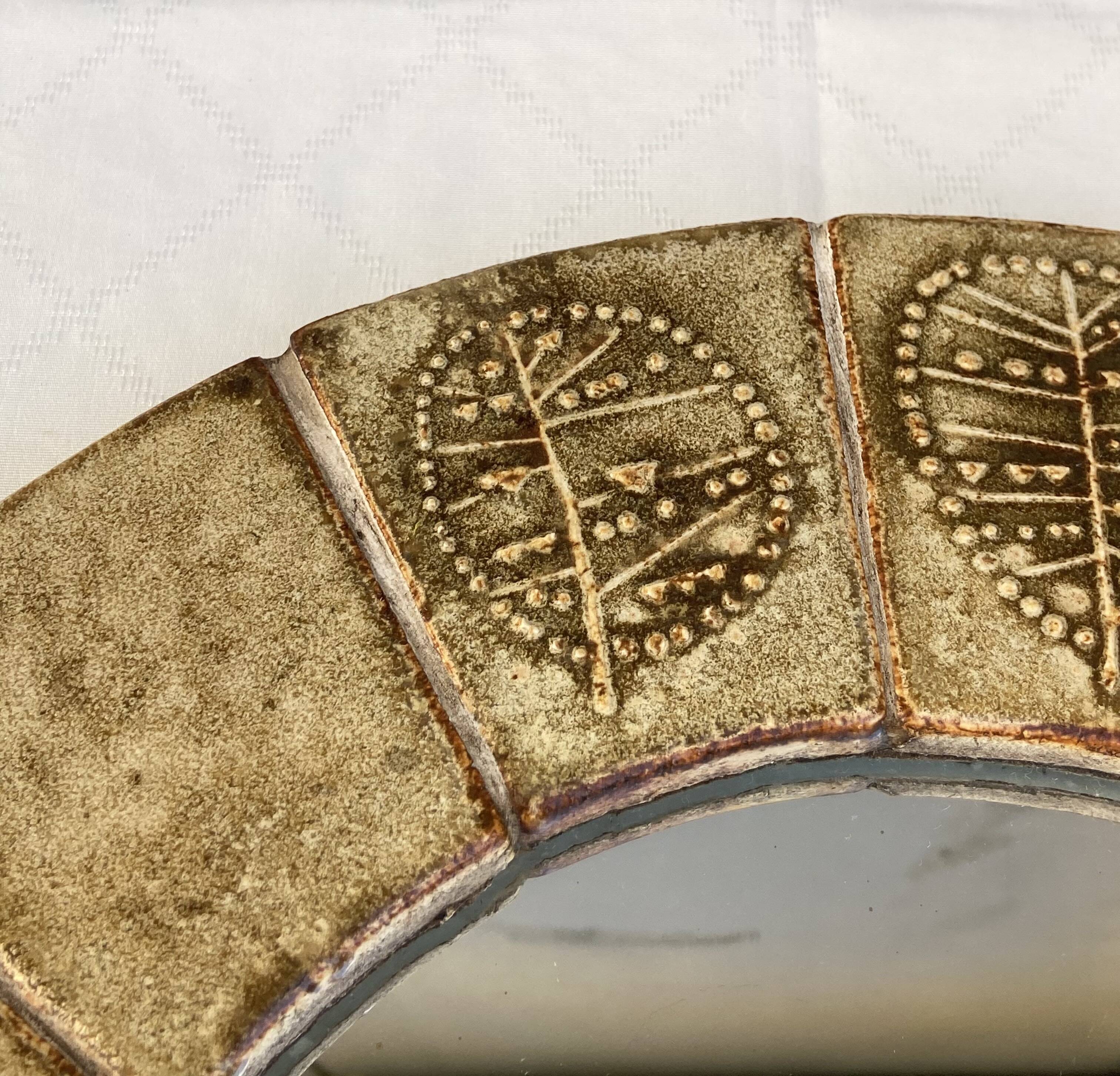 Ceramic mirror by Raymonde Leduc from the 1960s.