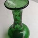 Green blown glass vase from the early 20th century.