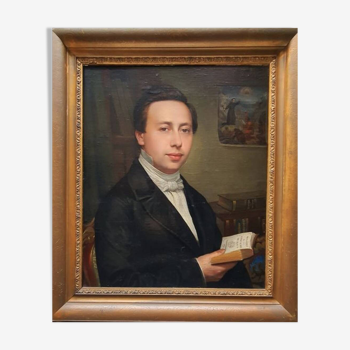 made french painting from the 19th century. portrait of a man holding a book