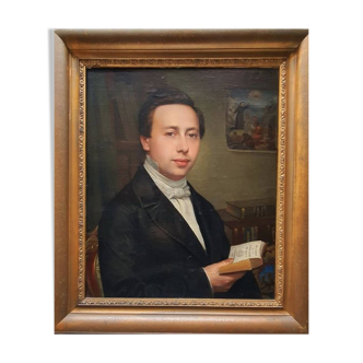 made french painting from the 19th century. portrait of a man holding a book