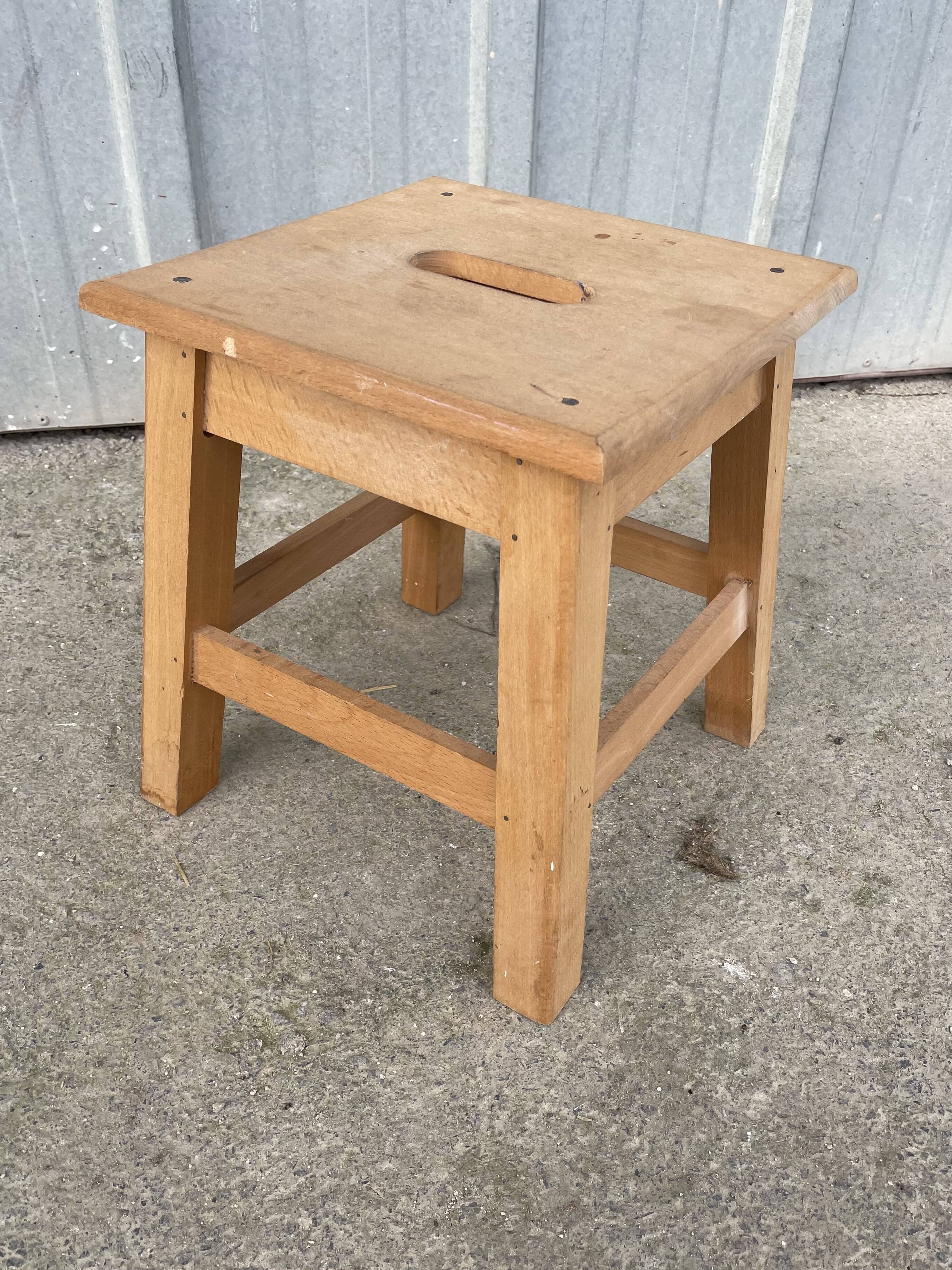 Small low wooden stool