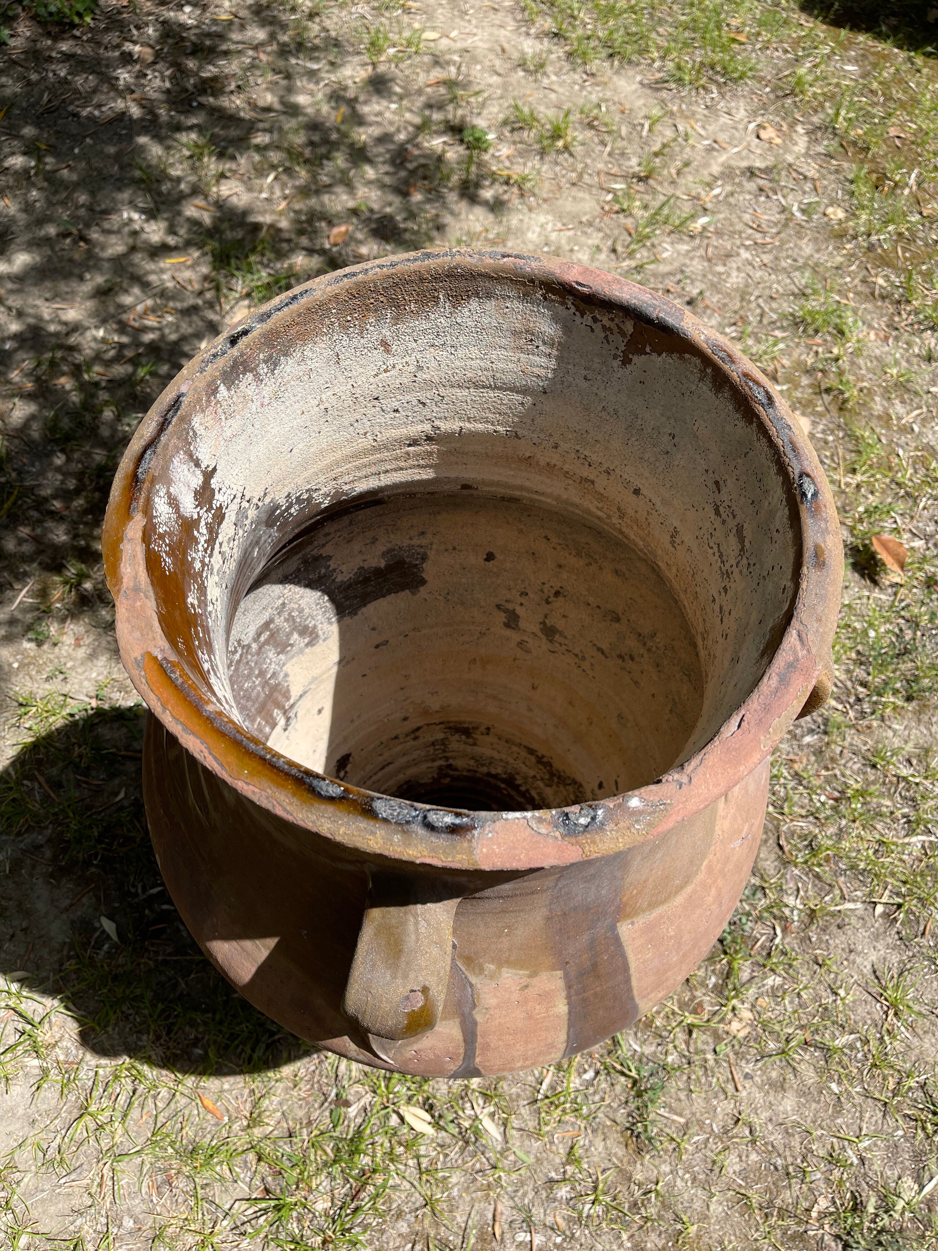Ancient terracotta pottery jar