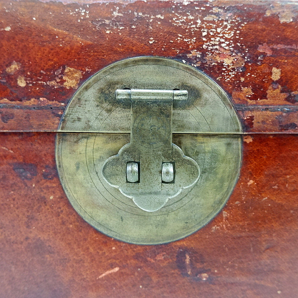 Chinese red lacquered leather trunk from the early 20th century.