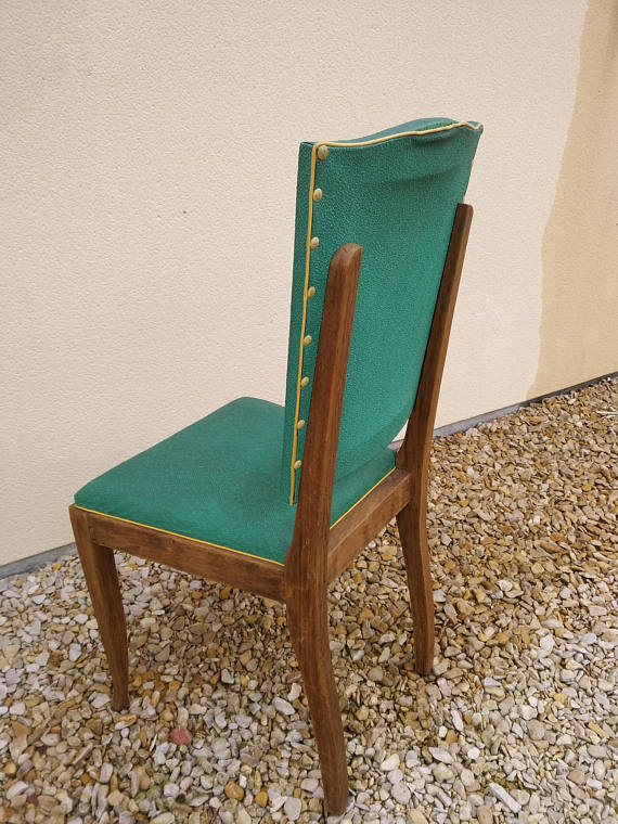 Skai vintage and sitting Chair wood and springs.