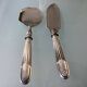 Antique silver serving cutlery with a Minerva hallmark.
