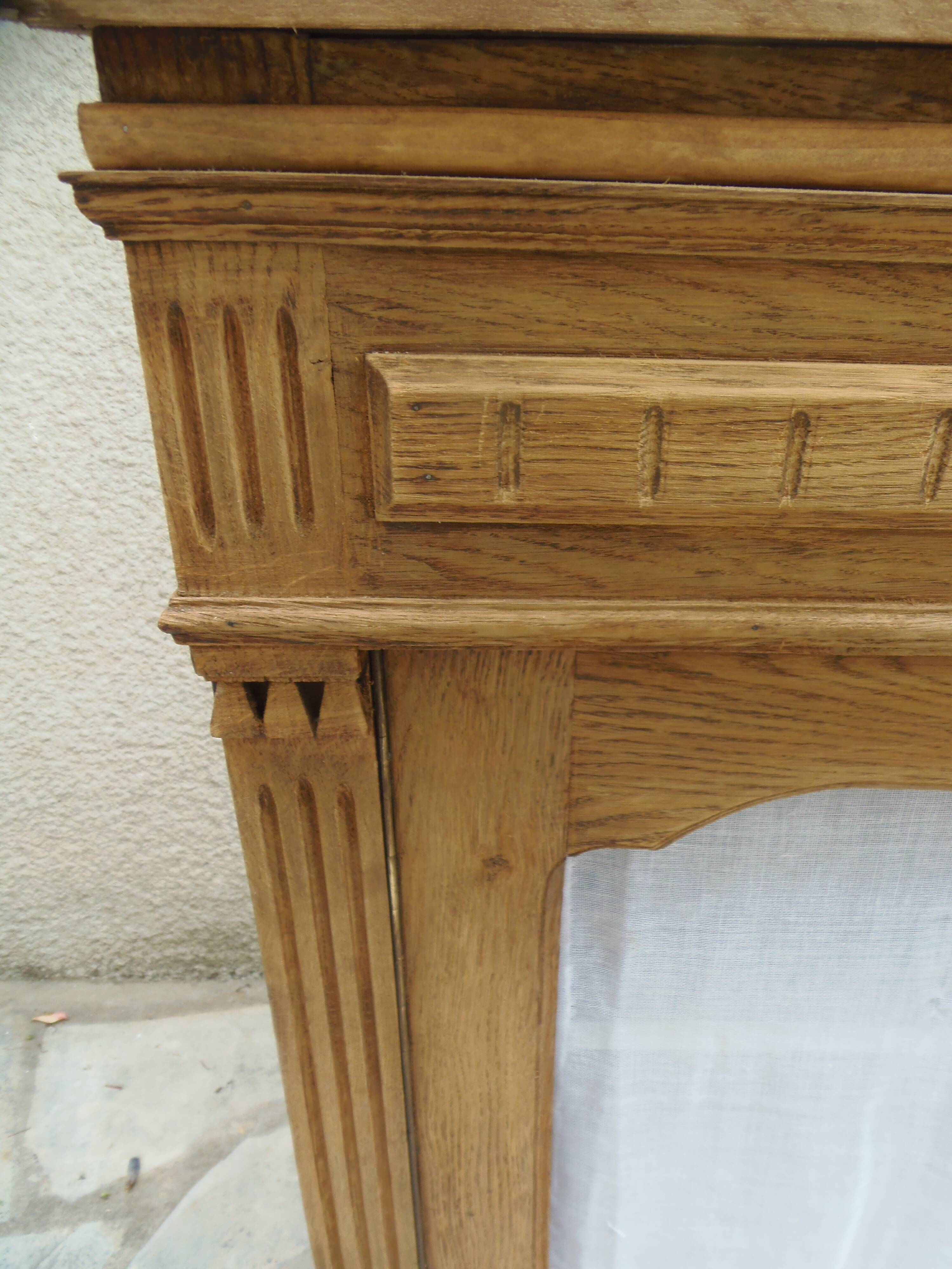Antique wooden sideboard, fabric doors and pearl grey shelves.