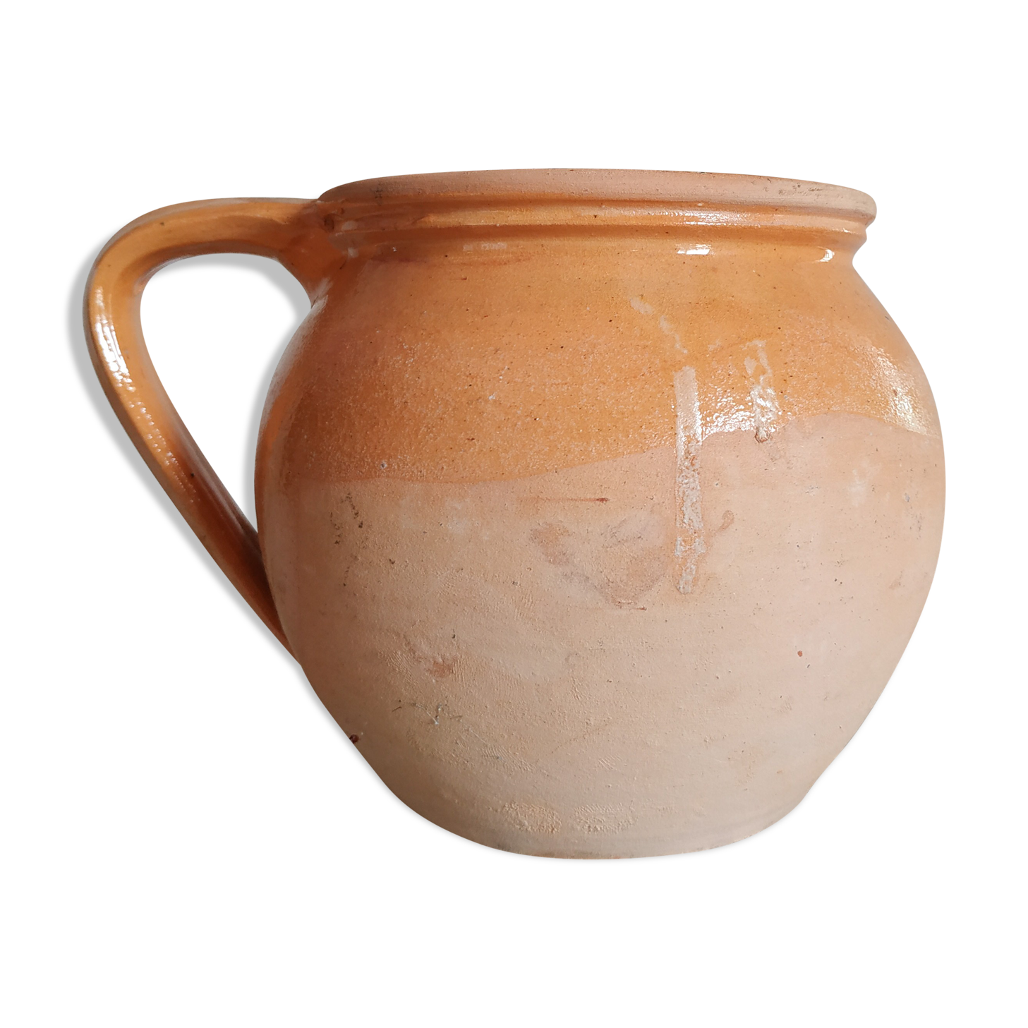 Old terracotta pot glazed ochre color