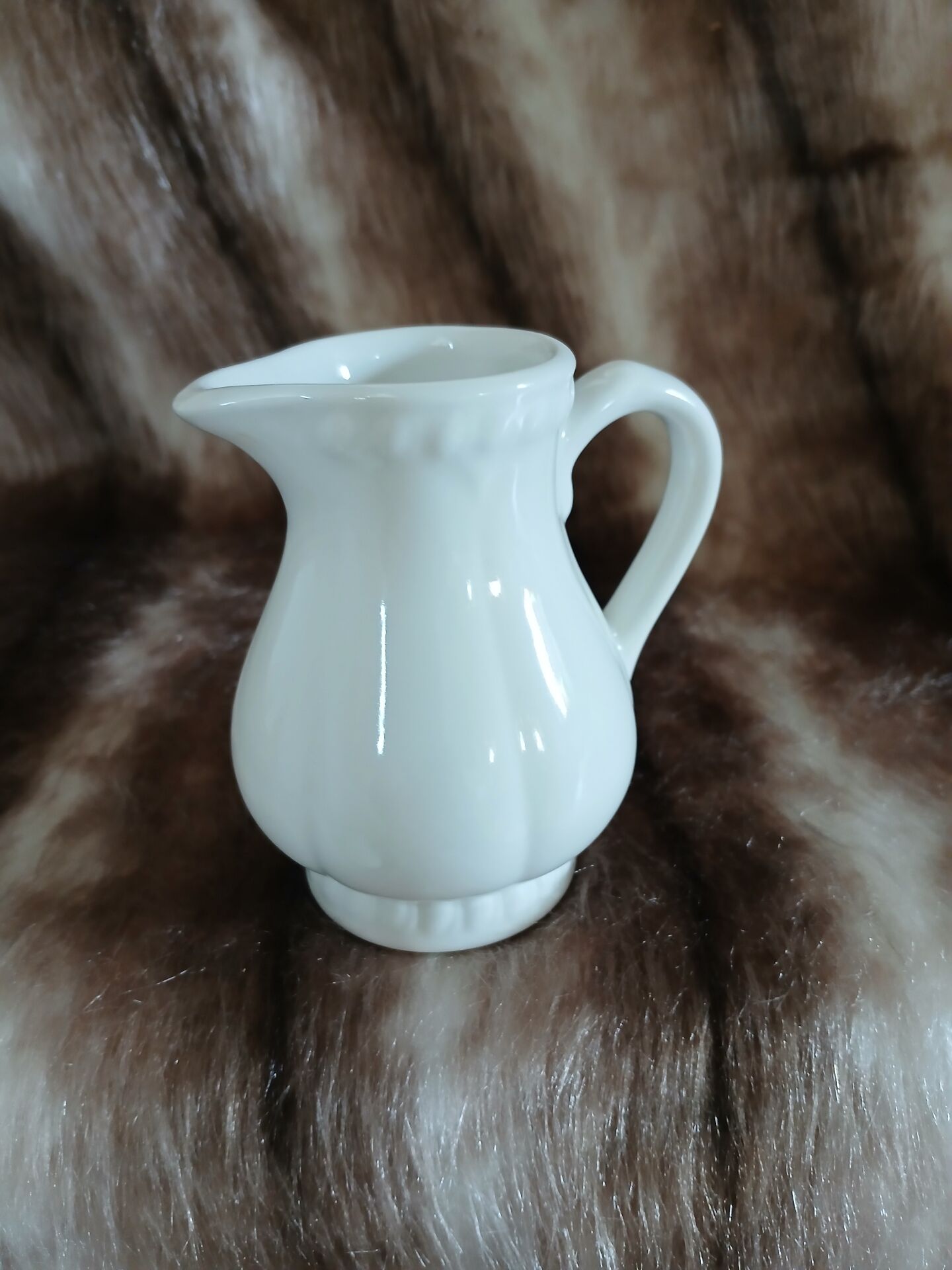 2 antique pitchers in white earthenware