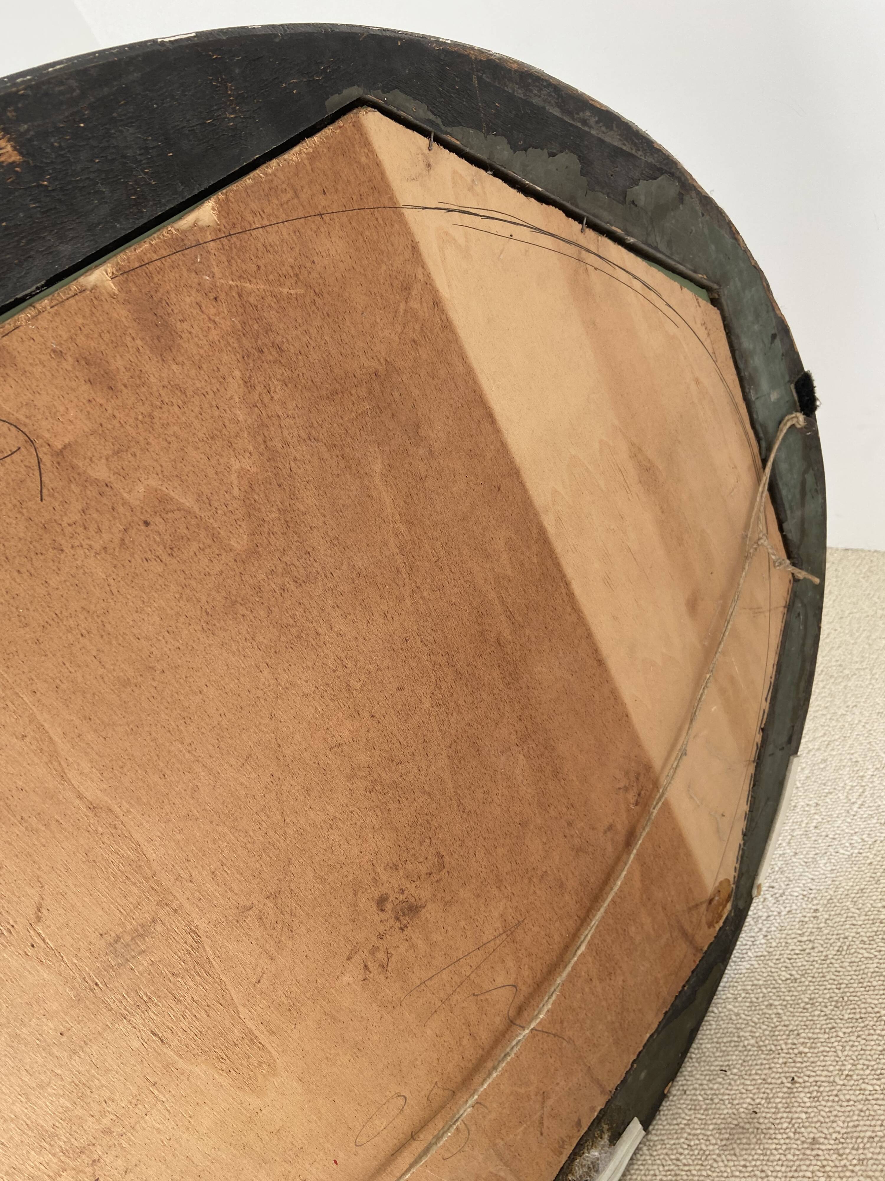 Black oval mirror, 19th century