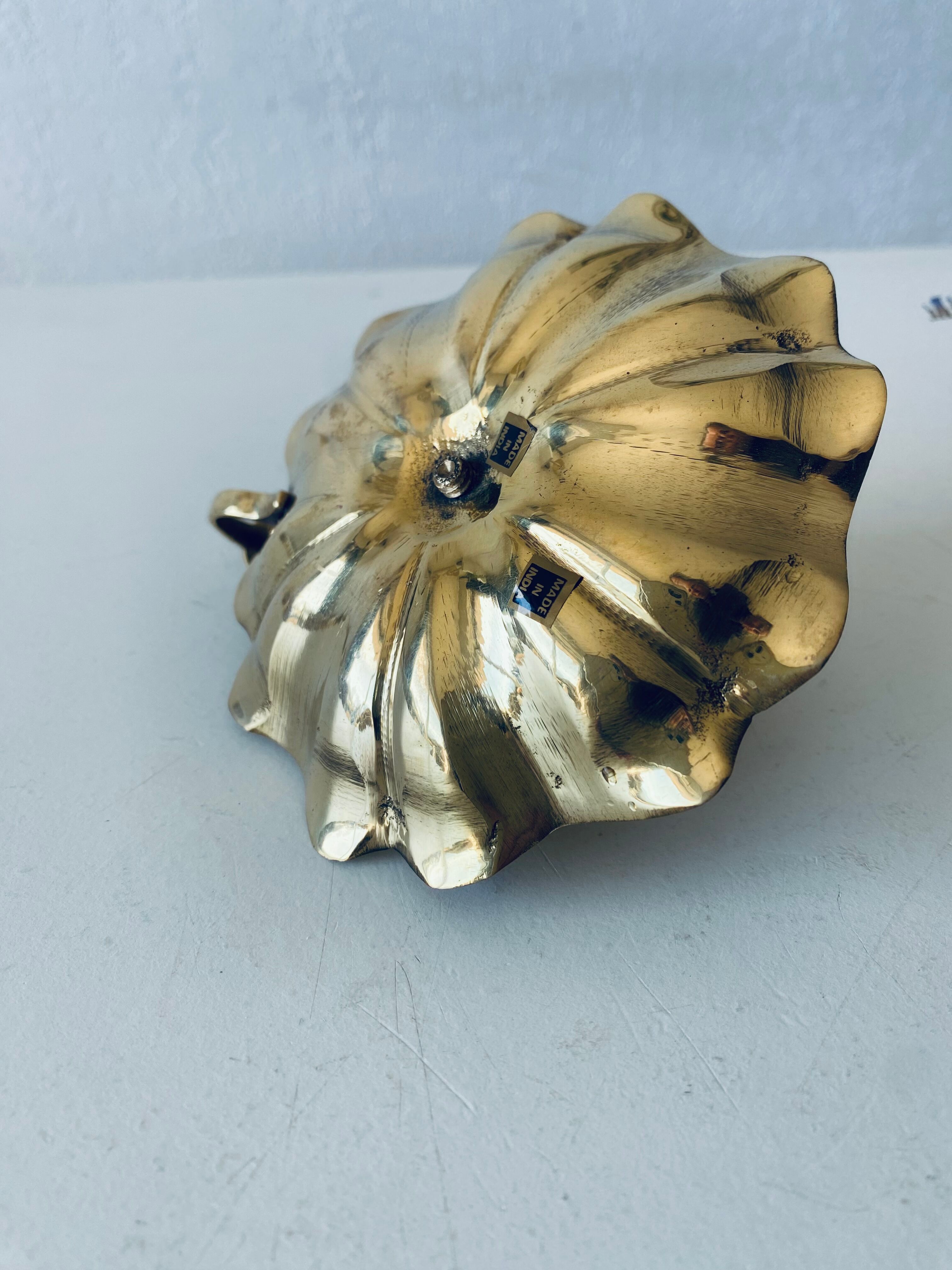 Indian candle holder in golden brass