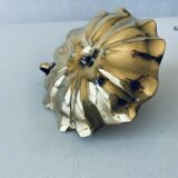 Indian candle holder in golden brass