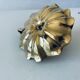 Indian candle holder in golden brass