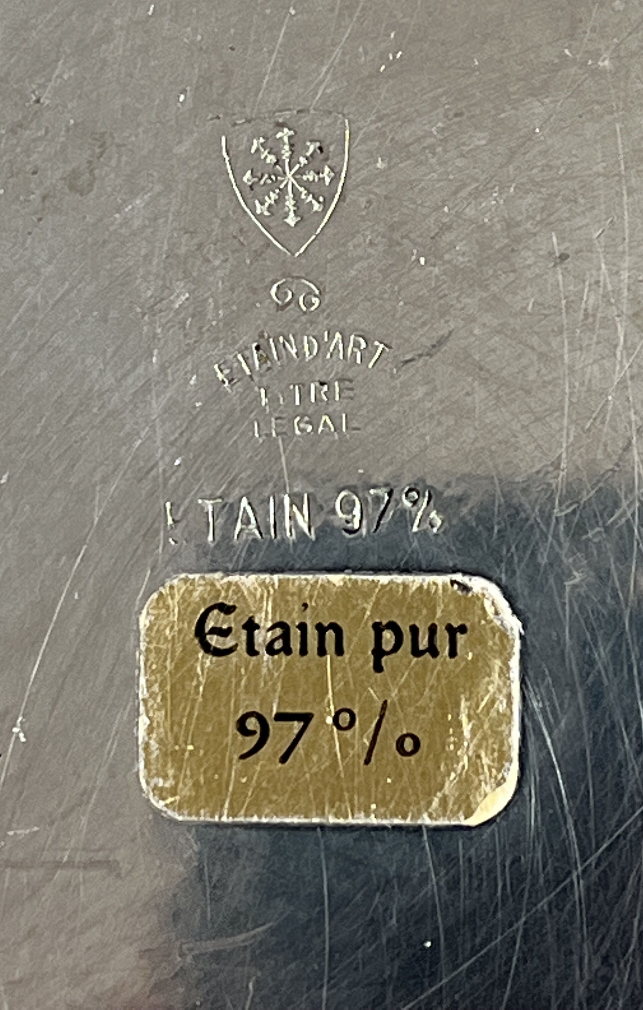 Circular pewter dish