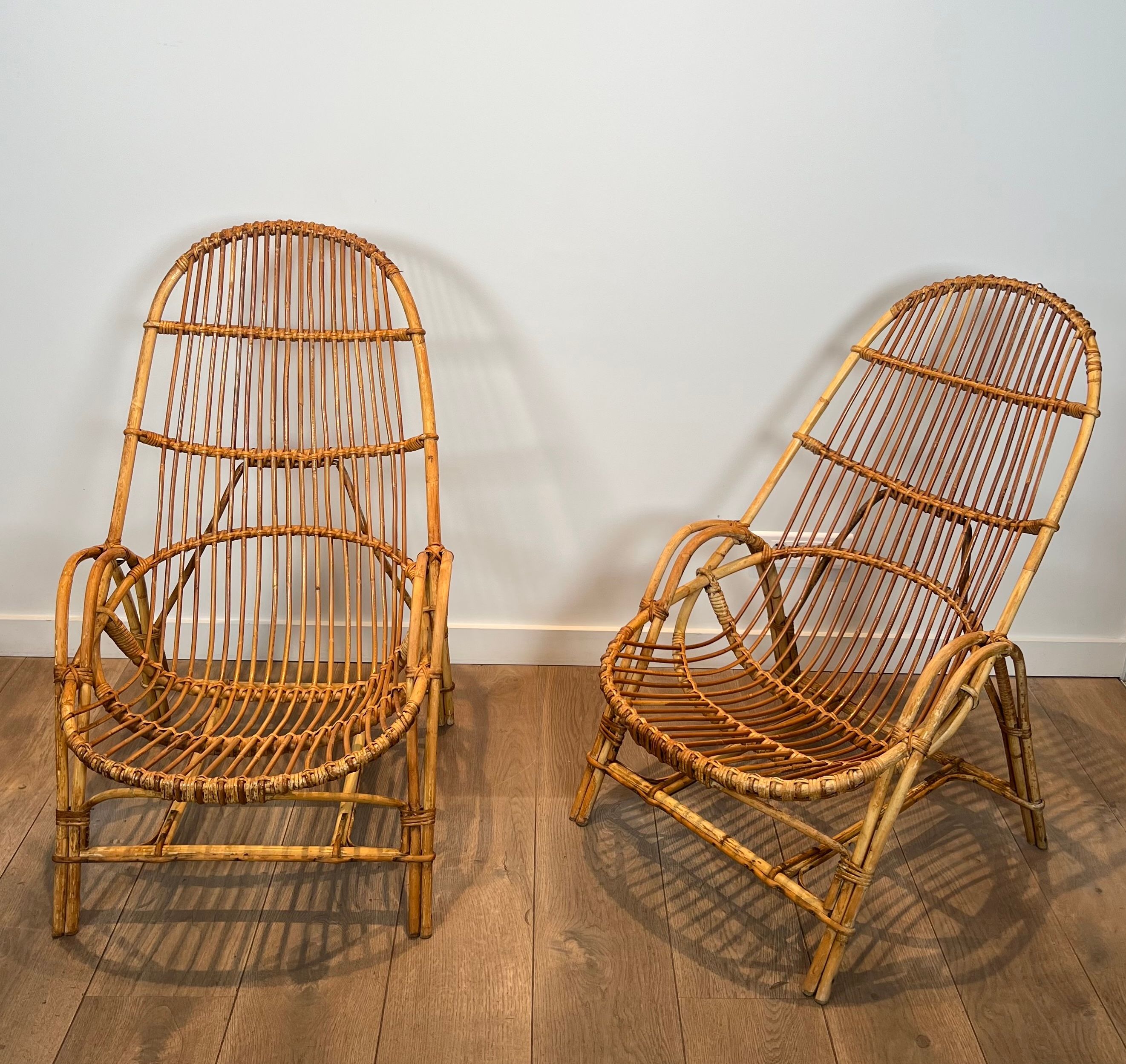 Pair of designer armchairs in rattan