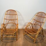 Pair of designer armchairs in rattan