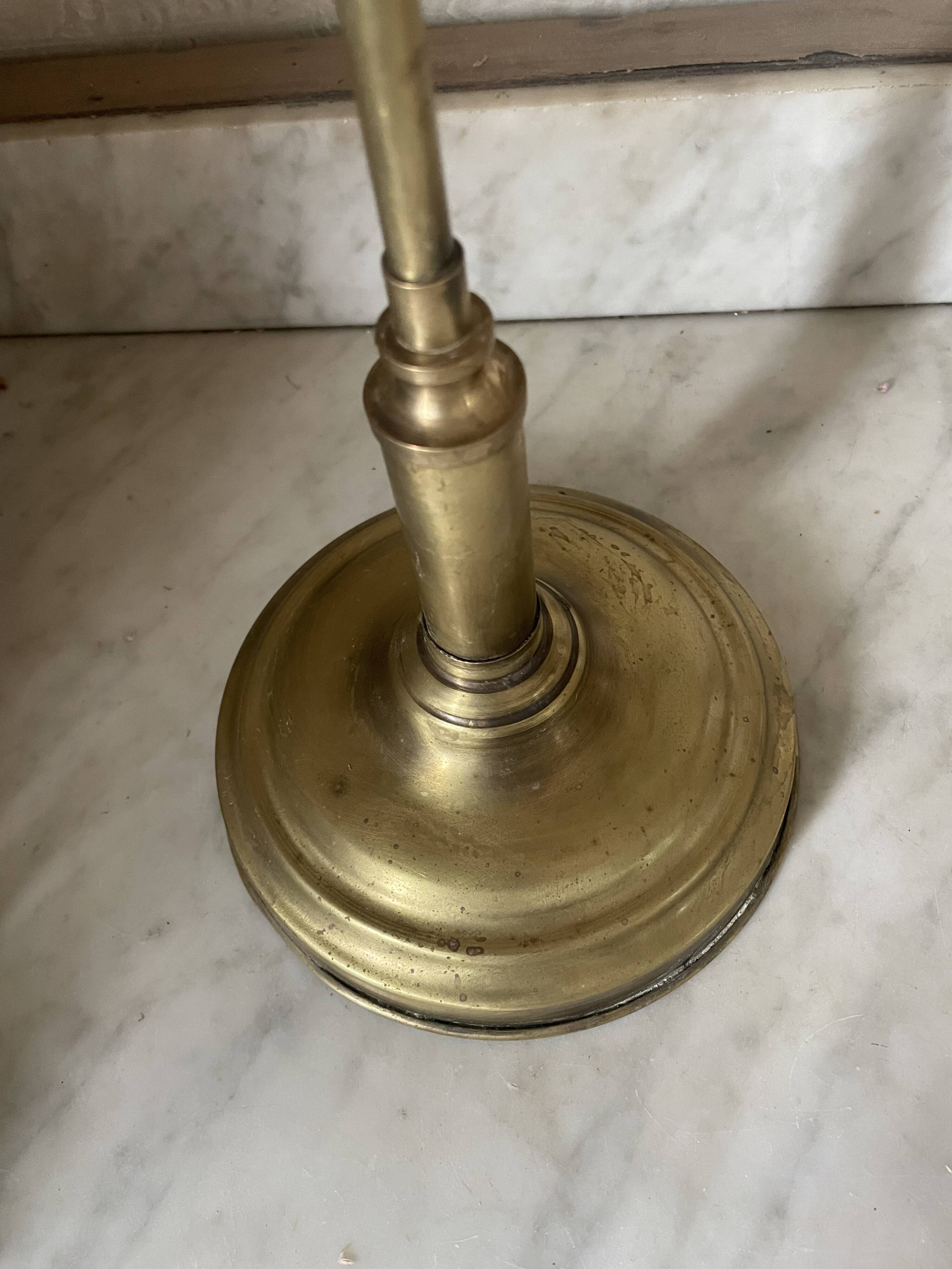 Large vintage lamp in brass with a pink opaline shade.