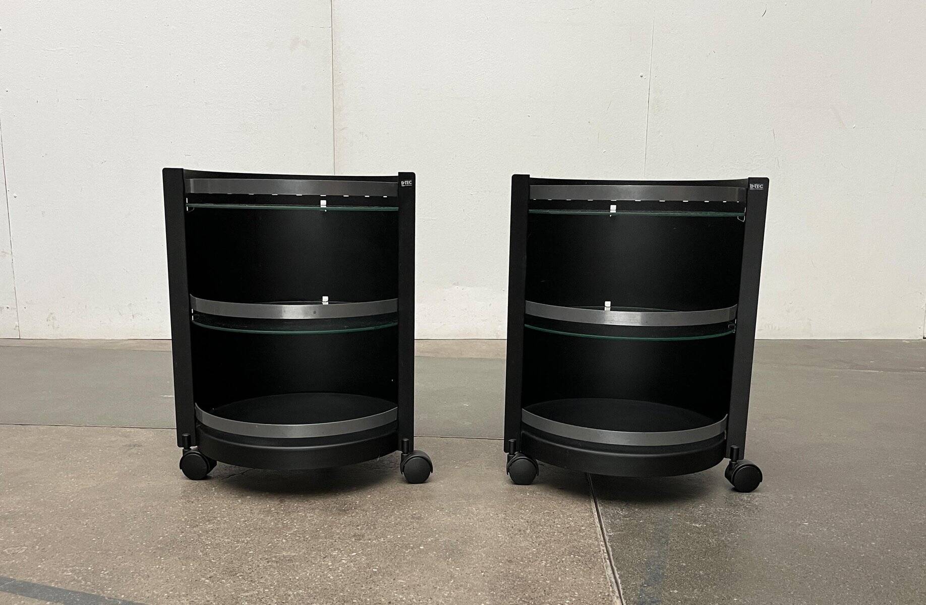 Postmodern German side tables in rolling metal and glass by D-Tec, 1980s, set of 2.