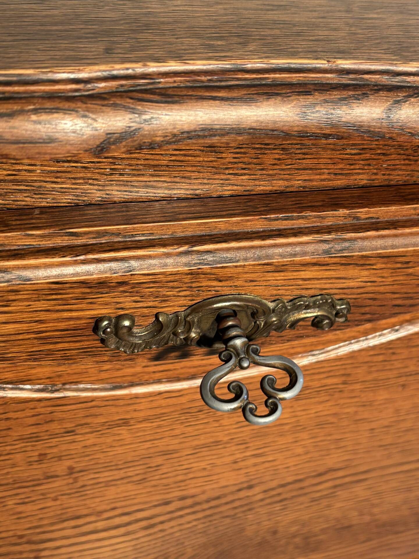 Louis XV style oak TV cabinet with drop-down flap.