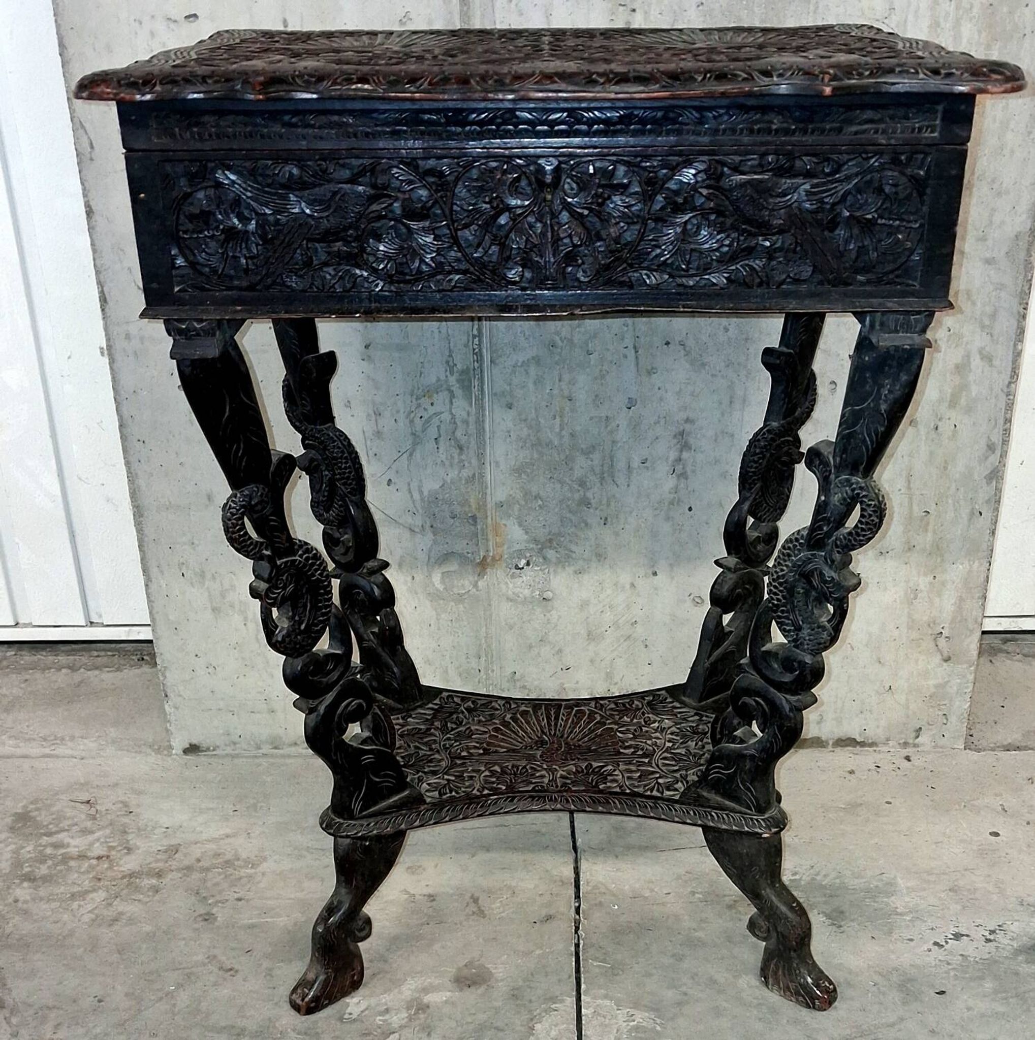 Ethnic carved wooden worker's furniture