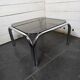 Chrome metal coffee table with smoked glass top from the 70s