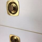 White retro wooden commode in Mid-Century style, tapered legs and gold handles (1960s)