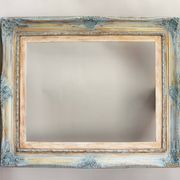 Wooden frame in Louis XV style. Baroque frame. Style of the frame.