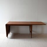 Vintage teak table by ISA Bergamo with drop-leaf extensions
